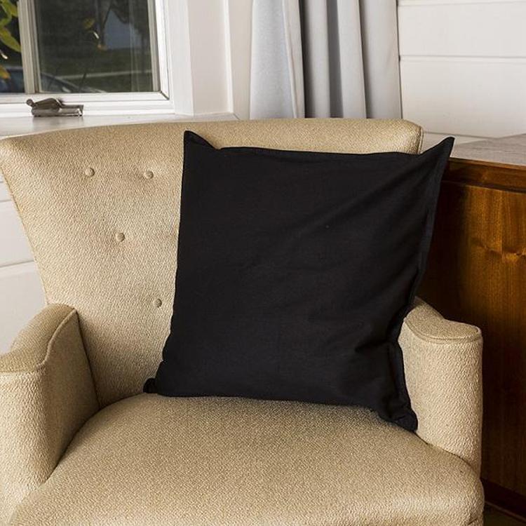 High-quality canvas pillow cover with zippered closure, customizable with monogramming.