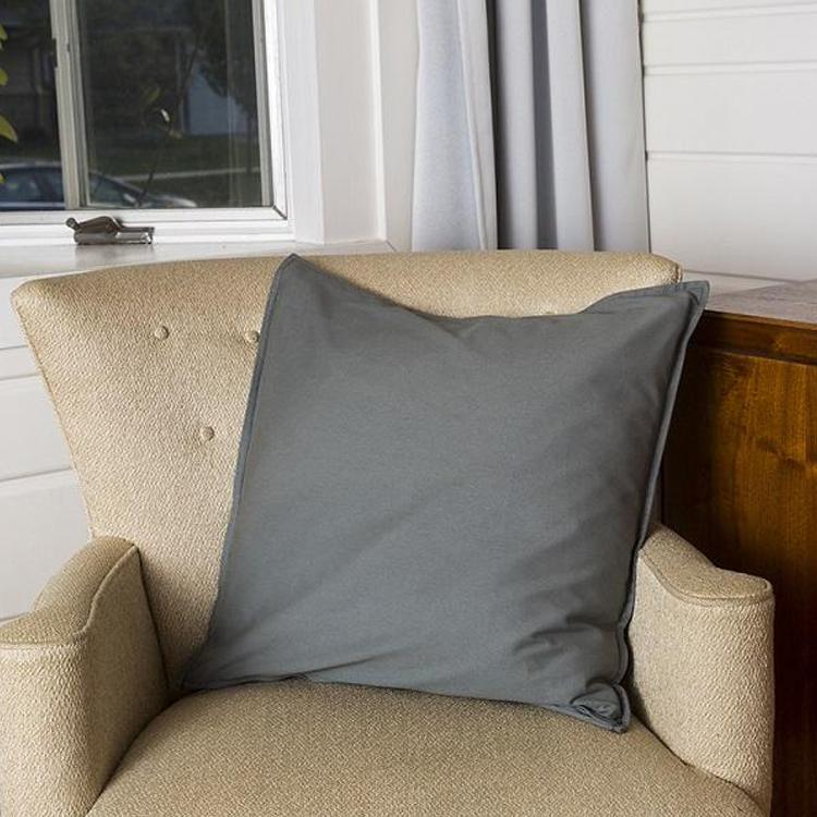 High-quality canvas pillow cover with zippered closure, customizable with monogramming.