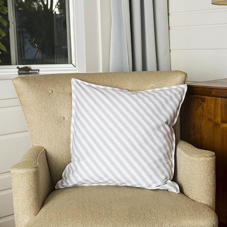 High-quality canvas pillow cover with zippered closure, customizable with monogramming.