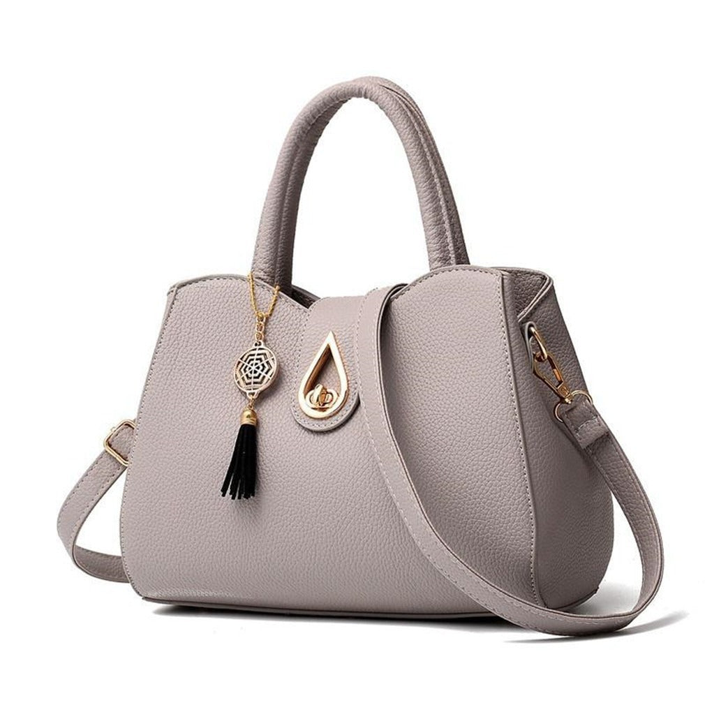 A stylish Portable Fashion Casual Shoulder Bag for Women made of PU fabric, featuring a horizontal square shape and a soft strap for comfortable carrying.