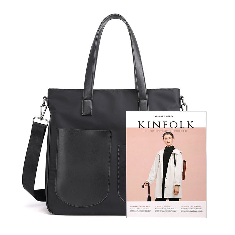 Portable Large Canvas Oxford Cloth Fashion Messenger Bag in a stylish design, featuring a trendy belt decoration and multiple carrying options.