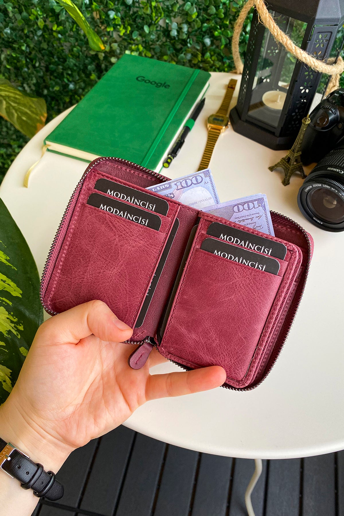 Porto Genuine Leather Wallet featuring a zipper, showcasing its elegant design and multiple card slots.