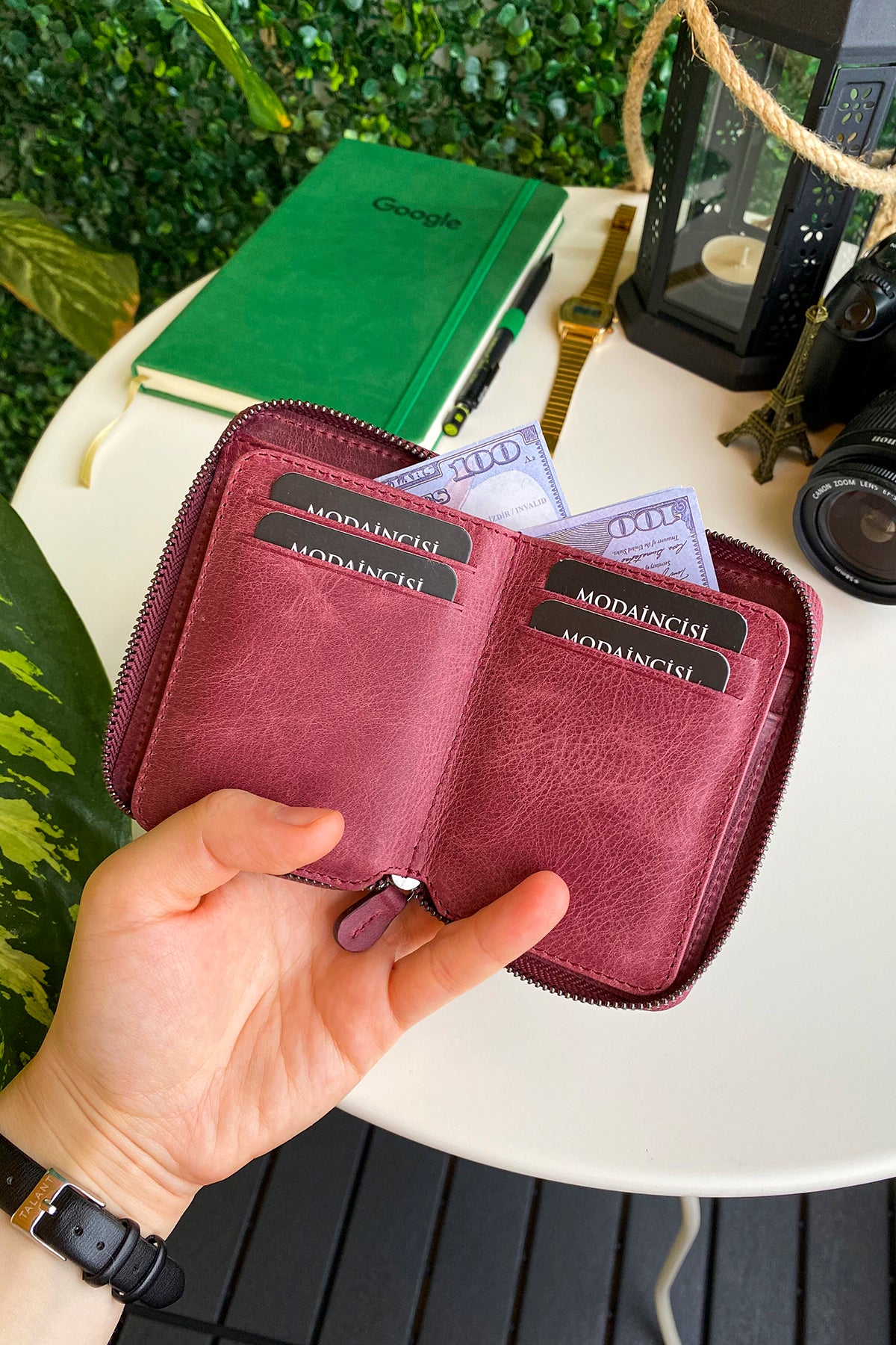 Porto Genuine Leather Wallet featuring a zipper, showcasing its elegant design and multiple card slots.