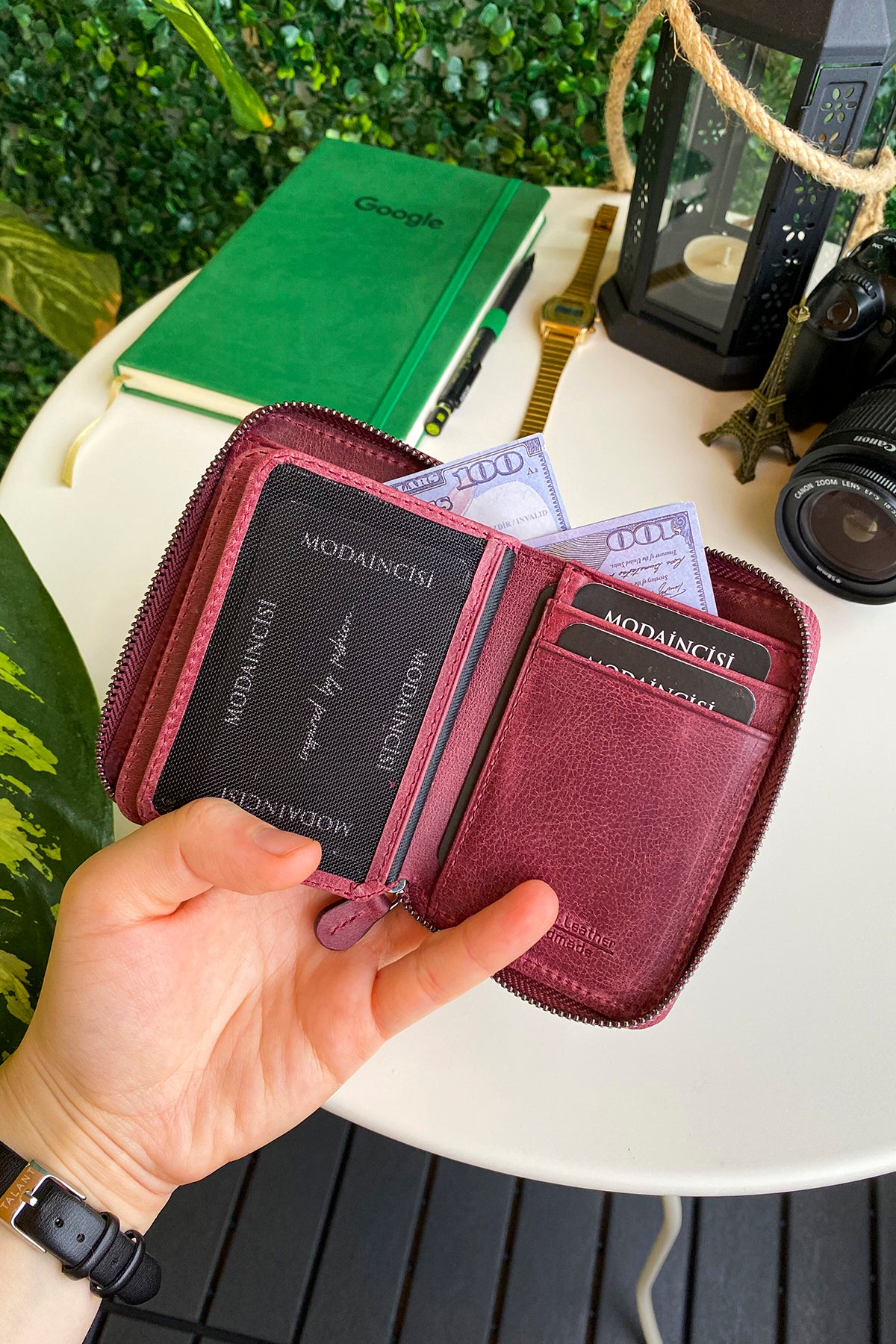 Porto Genuine Leather Wallet featuring a zipper, showcasing its elegant design and multiple card slots.