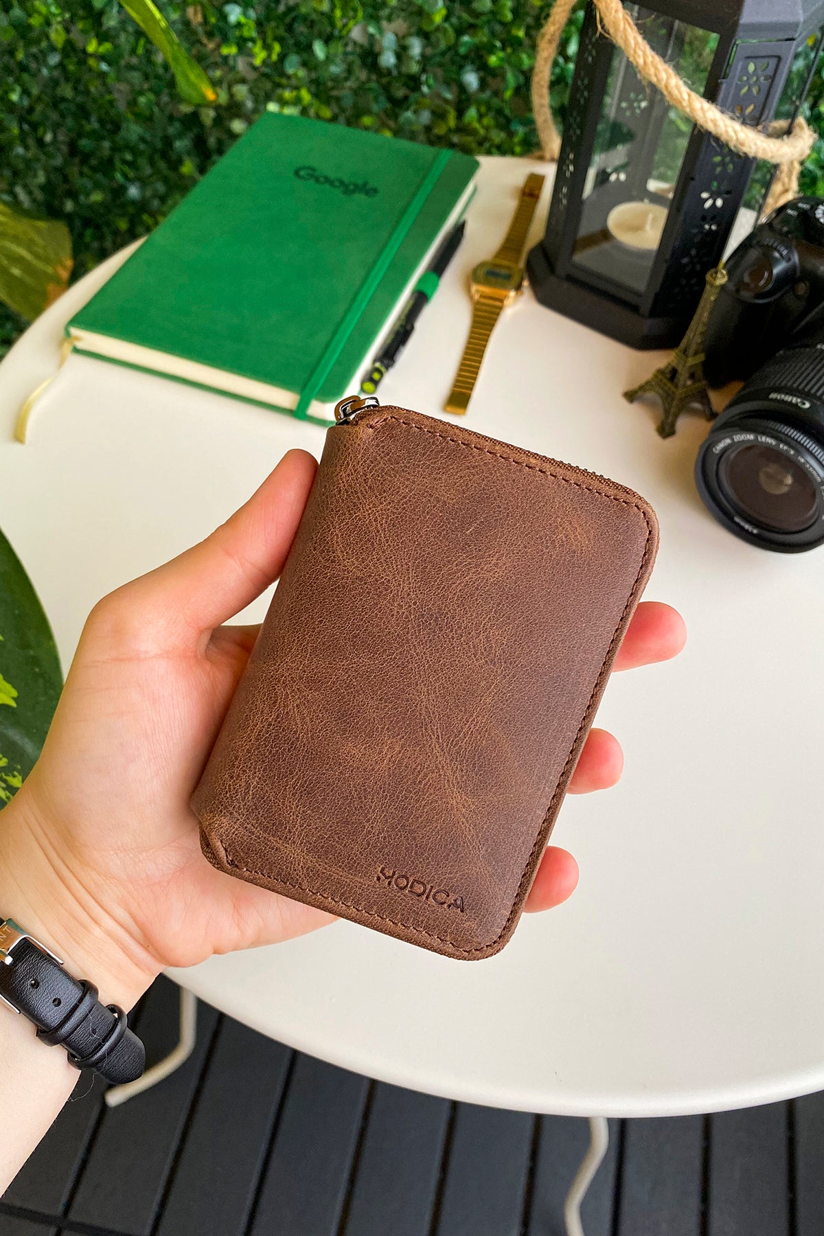 Porto Genuine Leather Wallet featuring a zipper, showcasing its elegant design and multiple card slots.