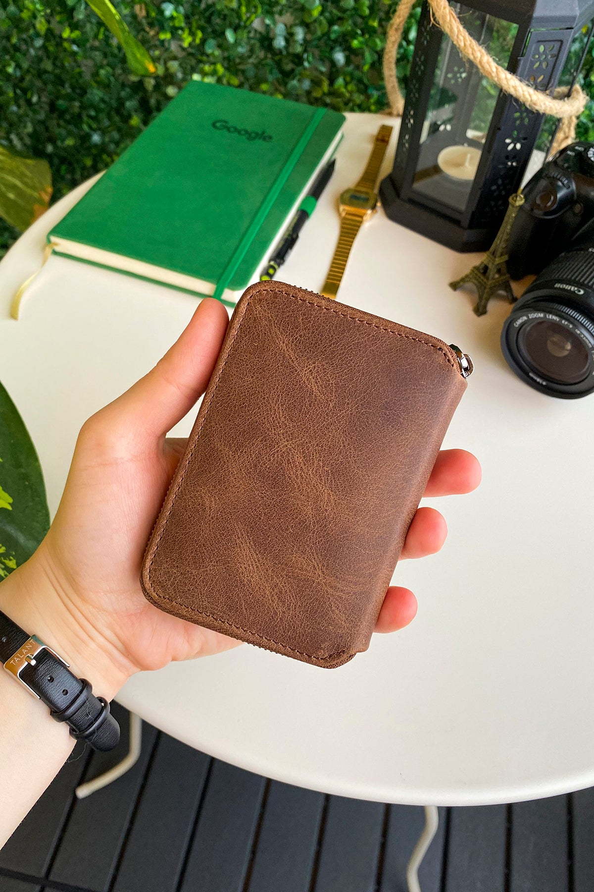 Porto Genuine Leather Wallet featuring a zipper, showcasing its elegant design and multiple card slots.