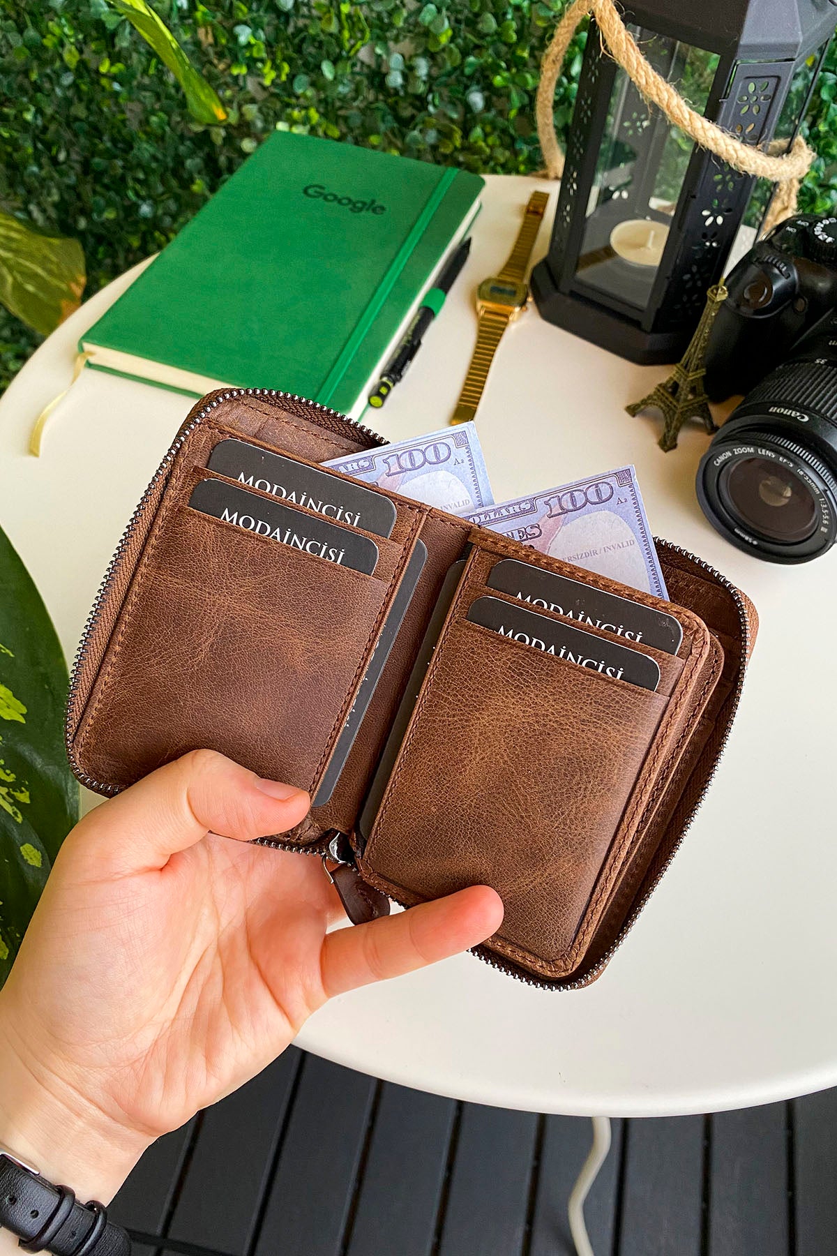 Porto Genuine Leather Wallet featuring a zipper, showcasing its elegant design and multiple card slots.