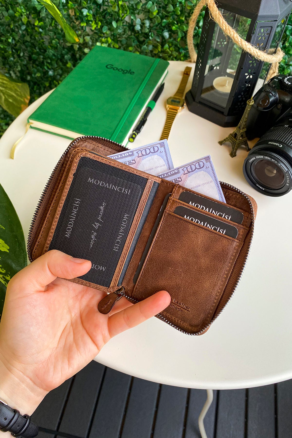 Porto Genuine Leather Wallet featuring a zipper, showcasing its elegant design and multiple card slots.