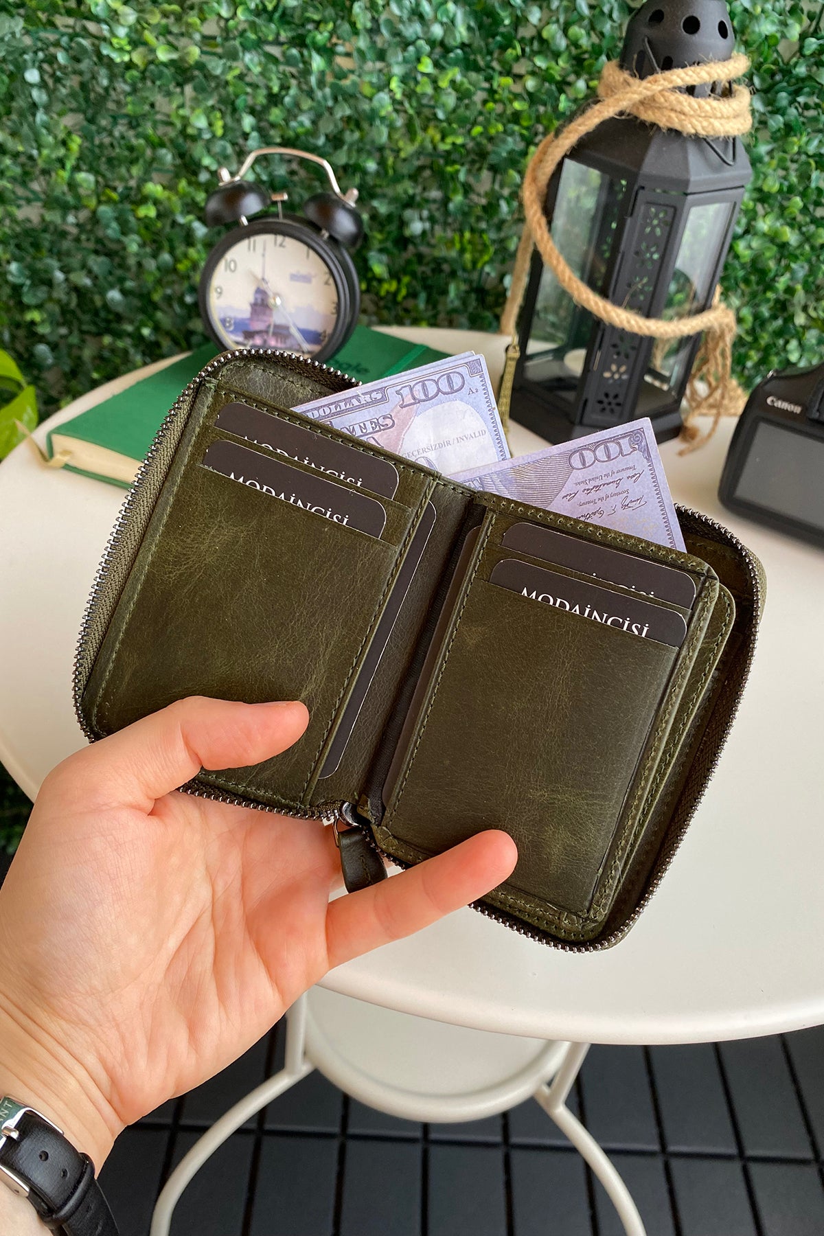 Porto Genuine Leather Wallet featuring a zipper, showcasing its elegant design and multiple card slots.