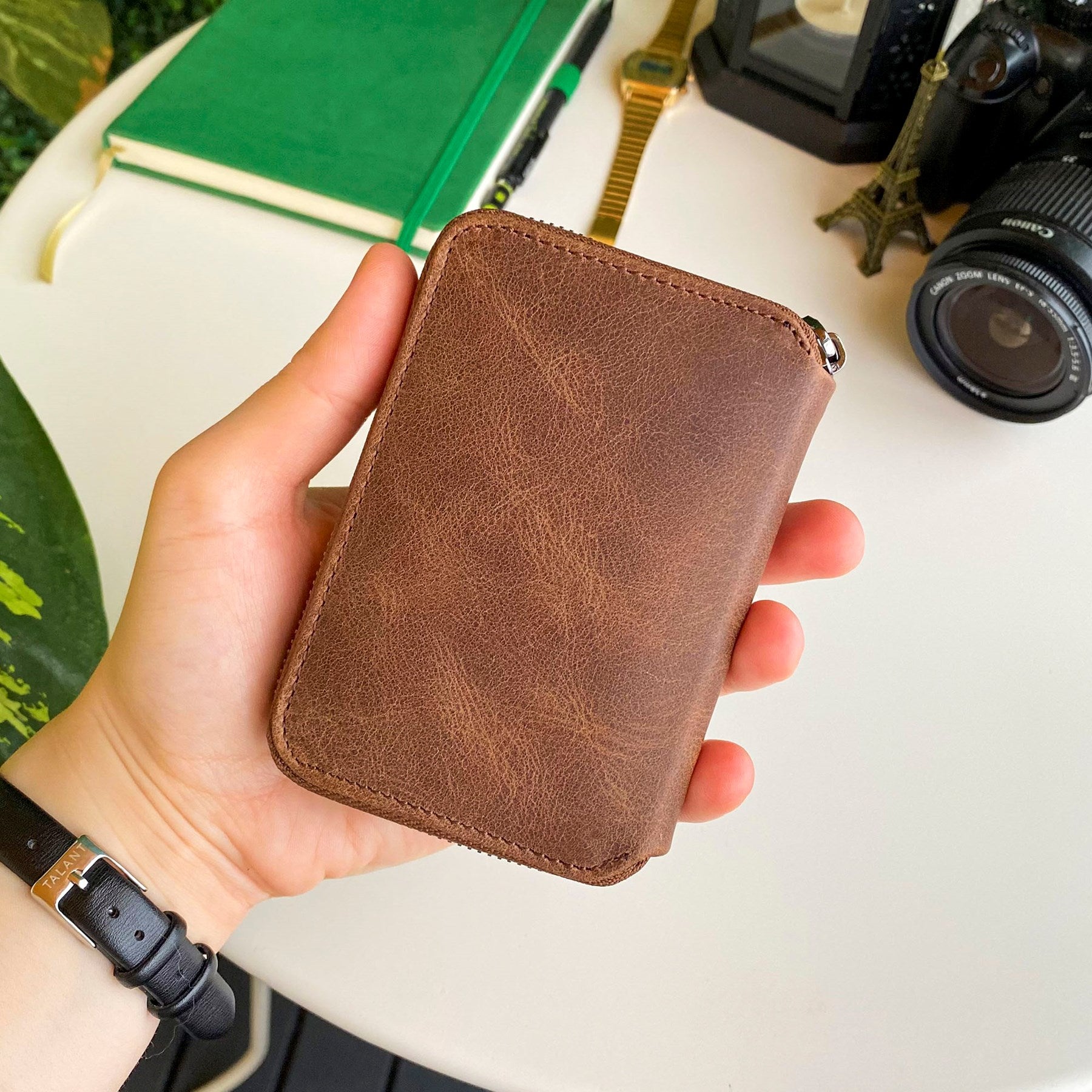 Porto Genuine Leather Wallet featuring a zipper, showcasing its elegant design and multiple card slots.