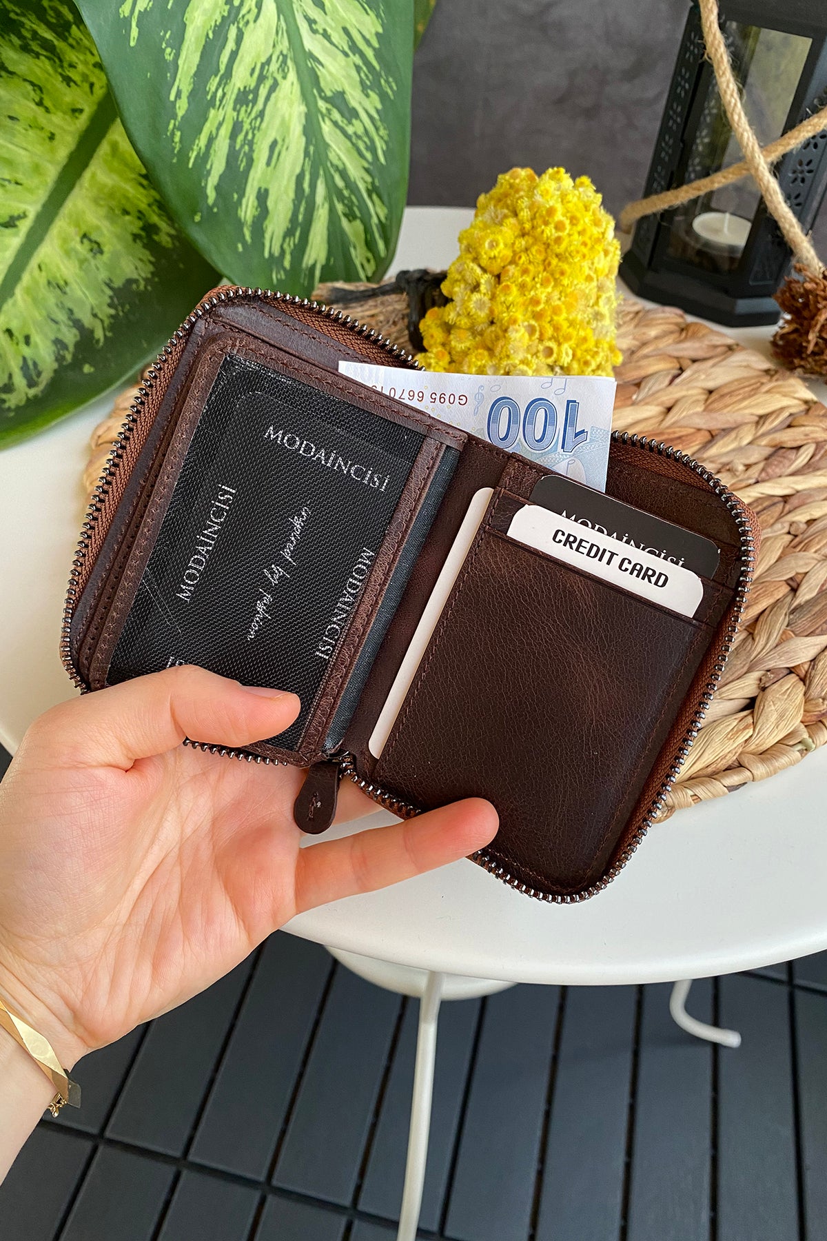 Porto Genuine Leather Wallet featuring a zipper, showcasing its elegant design and multiple card slots.