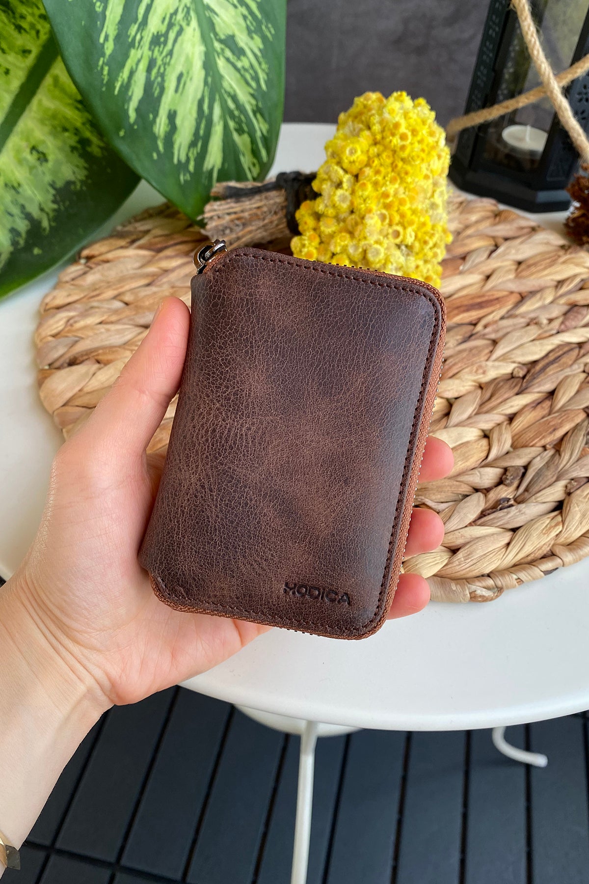 Porto Genuine Leather Wallet featuring a zipper, showcasing its elegant design and multiple card slots.