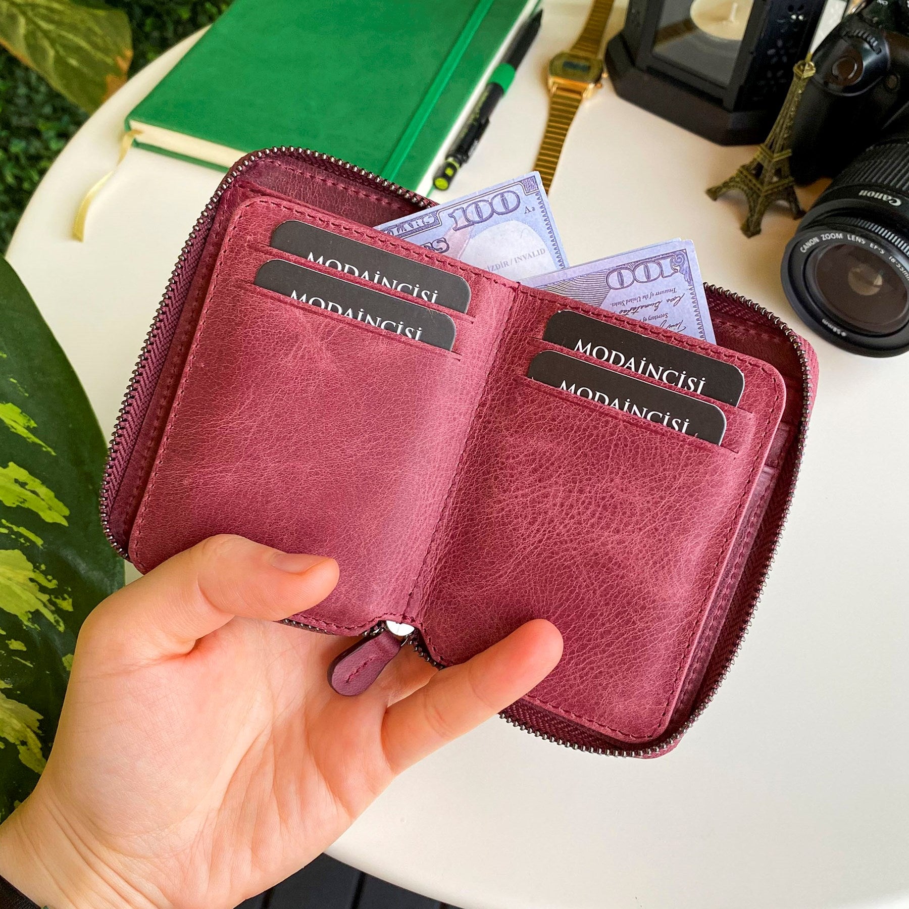 Porto Genuine Leather Wallet featuring a zipper, showcasing its elegant design and multiple card slots.