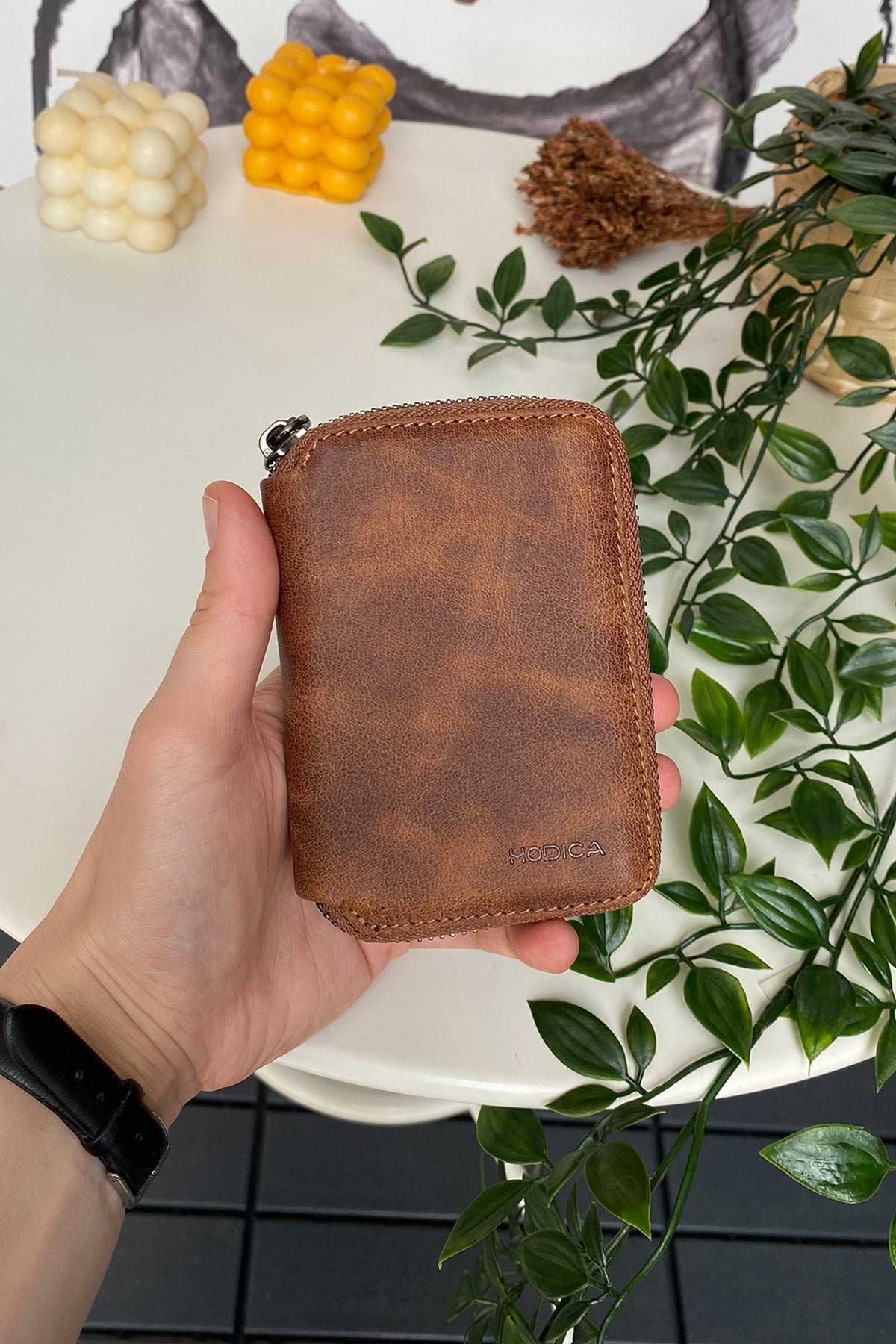 Porto Genuine Leather Wallet featuring a zipper, showcasing its elegant design and multiple card slots.