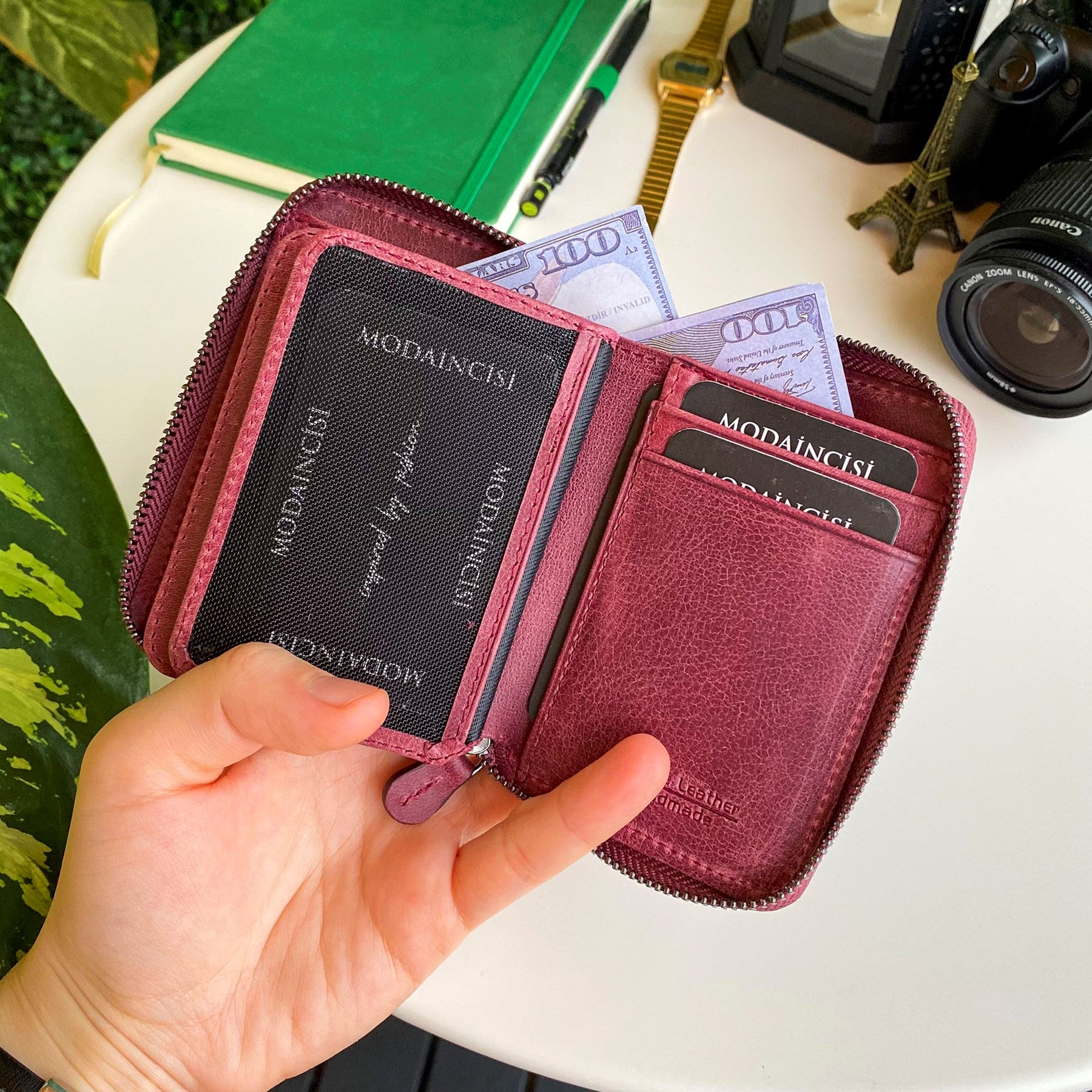 Porto Genuine Leather Wallet featuring a zipper, showcasing its elegant design and multiple card slots.