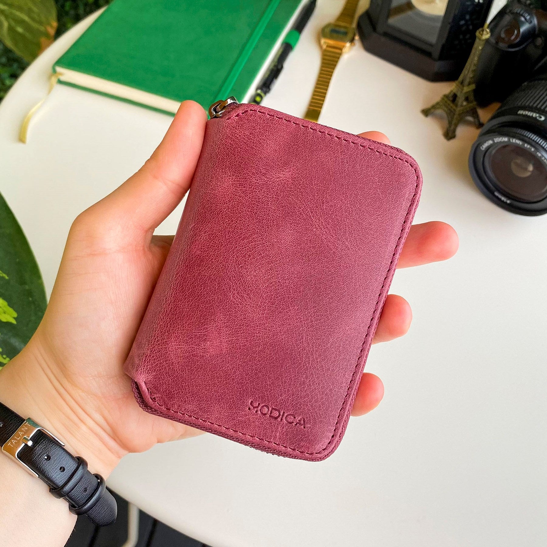 Porto Genuine Leather Wallet featuring a zipper, showcasing its elegant design and multiple card slots.