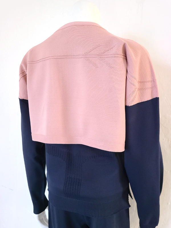 Poseasy Yoga set featuring a wholegarment knitted top and leggings in navy/pink and light pink/pink color combinations.