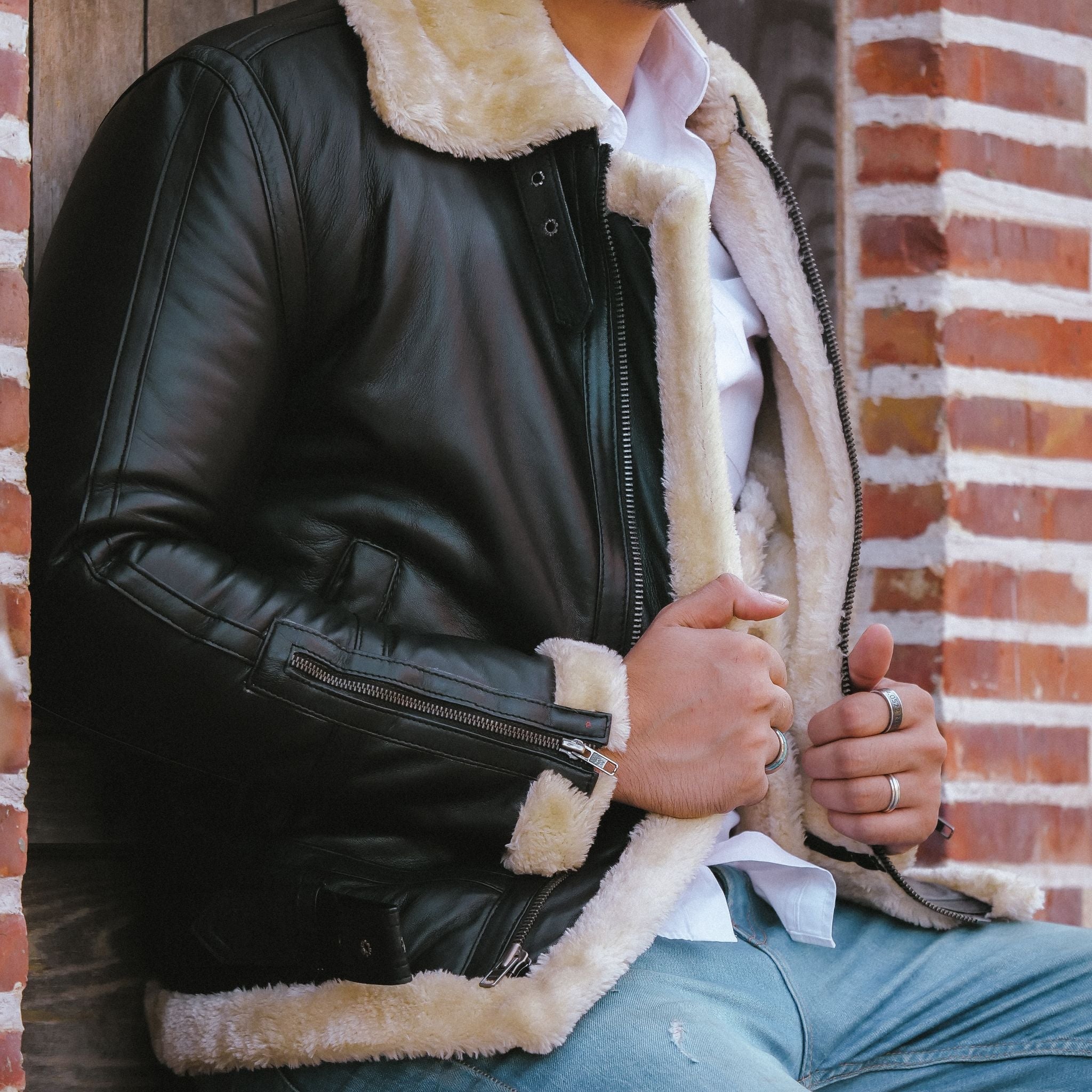 Premium Shearling Fur Leather Jacket in Black, featuring genuine sheepskin leather, full fur lining, and stylish bomber design.