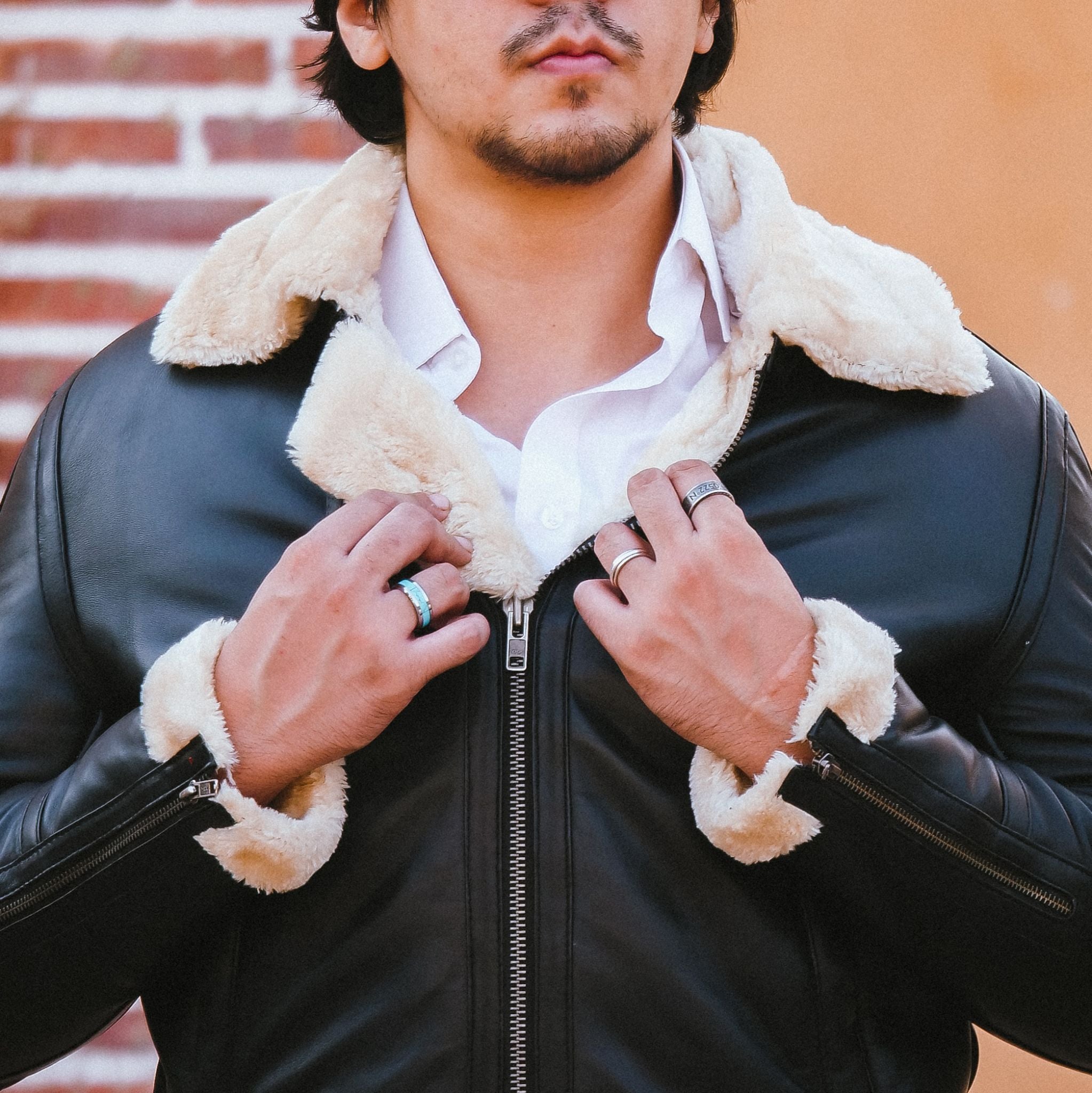 Premium Shearling Fur Leather Jacket in Black, featuring genuine sheepskin leather, full fur lining, and stylish bomber design.