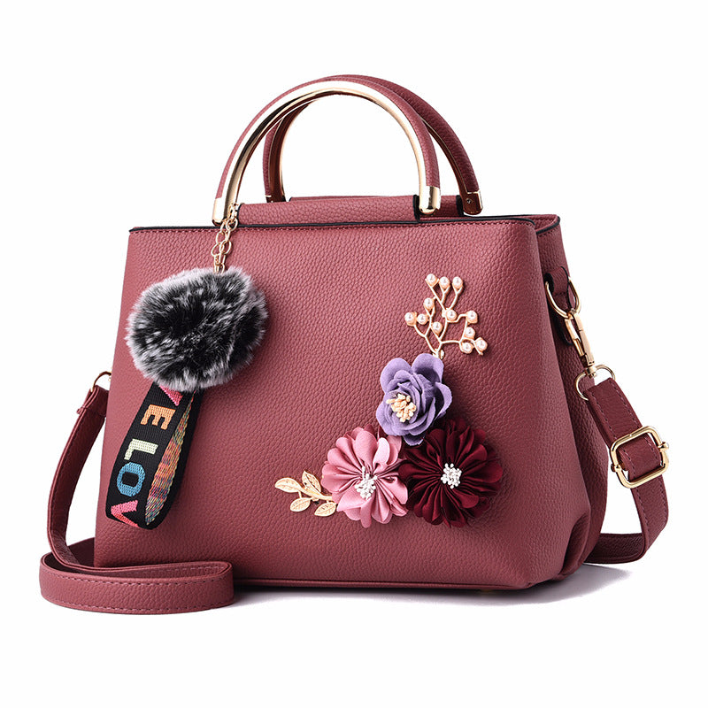 Pure Color Fashion Embroidered Portable Messenger Bag featuring floral embroidery, durable PU fabric, and a compact design.