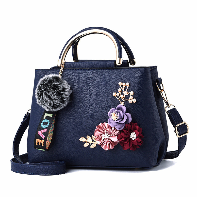 Pure Color Fashion Embroidered Portable Messenger Bag featuring floral embroidery, durable PU fabric, and a compact design.