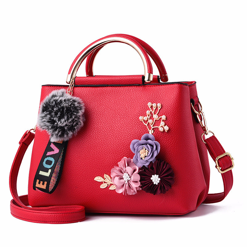 Pure Color Fashion Embroidered Portable Messenger Bag featuring floral embroidery, durable PU fabric, and a compact design.