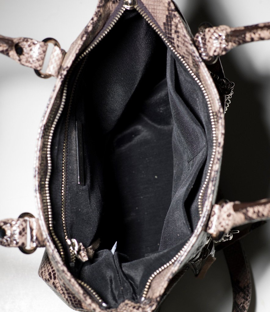 Stylish Python Tote with Detachable Mini Bag, showcasing high-quality leather and edgy design.