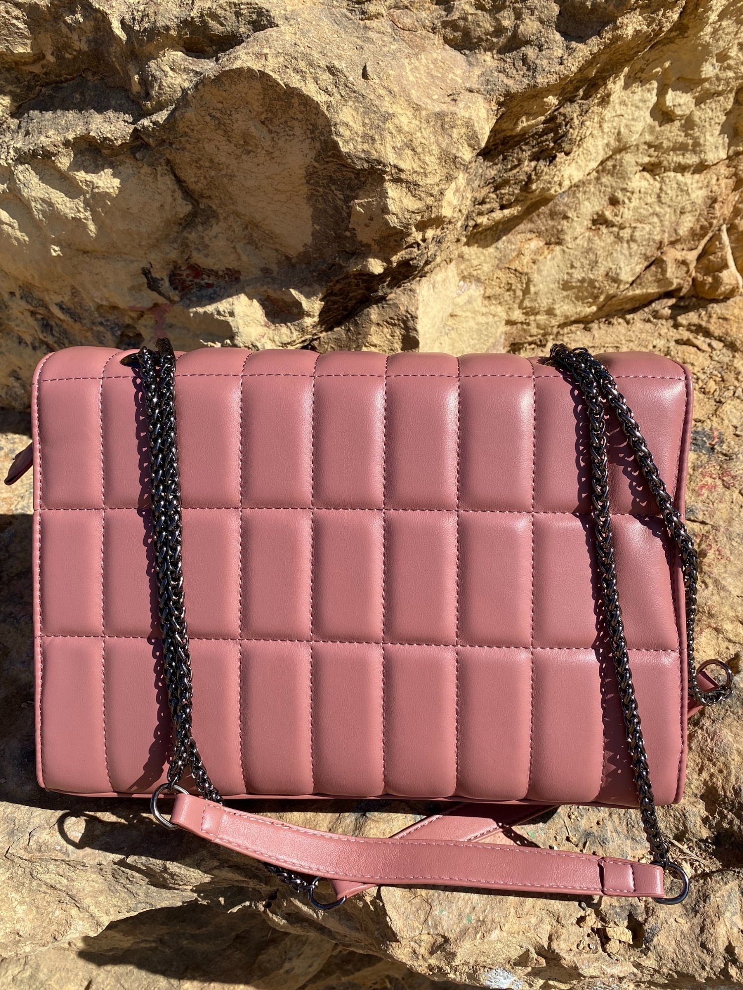 Quilted chain strap shoulder bag in blue, pink, and green colors with a stylish design and double chain-link straps.