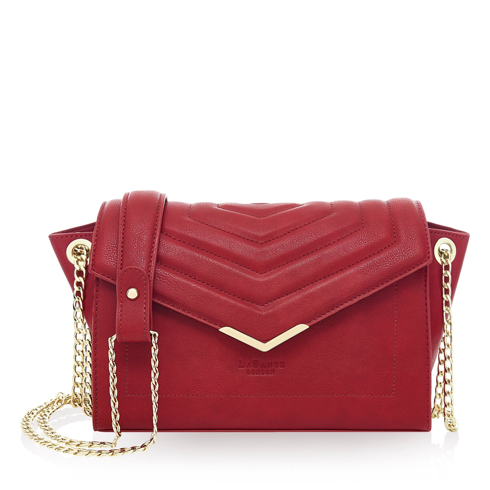 Red Kensington Vegan Quilted Cross-Body Bag with double gold chain strap and magnetic closure, showcasing its elegant quilted design.