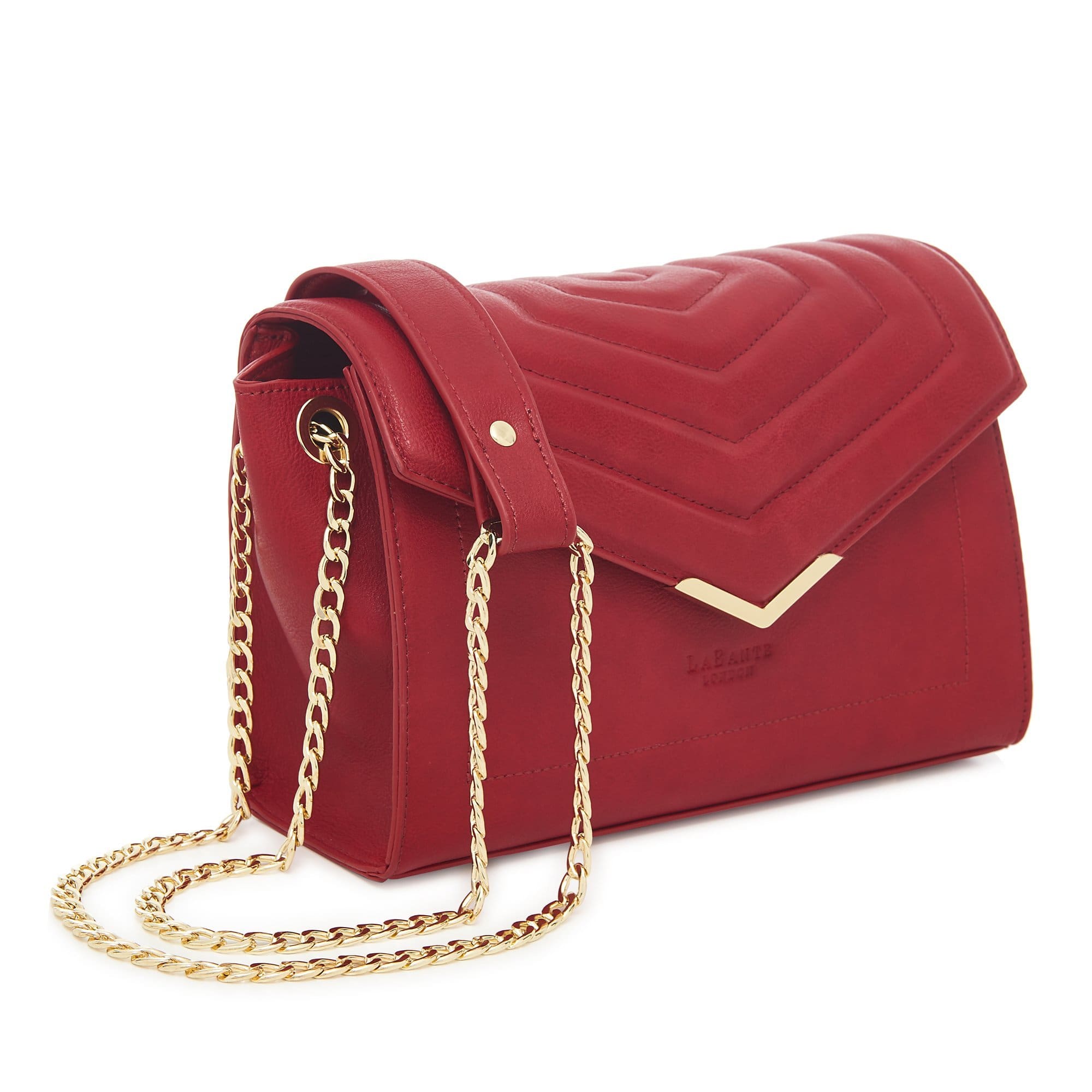 Red Kensington Vegan Quilted Cross-Body Bag with double gold chain strap and magnetic closure, showcasing its elegant quilted design.