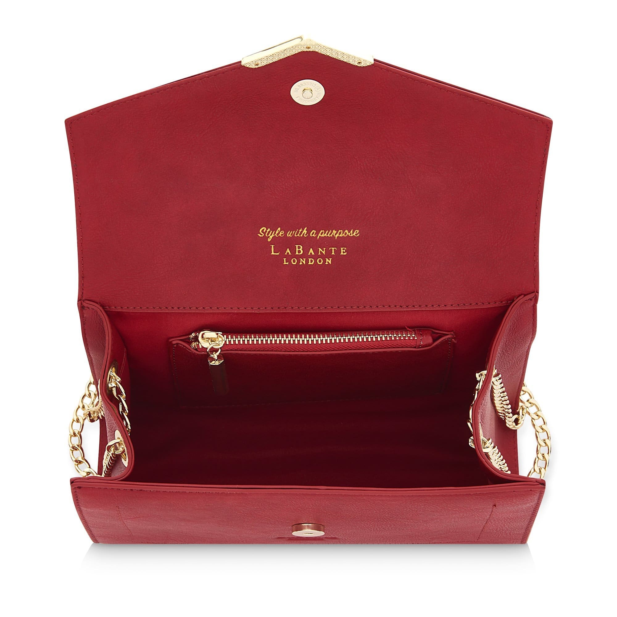 Red Kensington Vegan Quilted Cross-Body Bag with double gold chain strap and magnetic closure, showcasing its elegant quilted design.