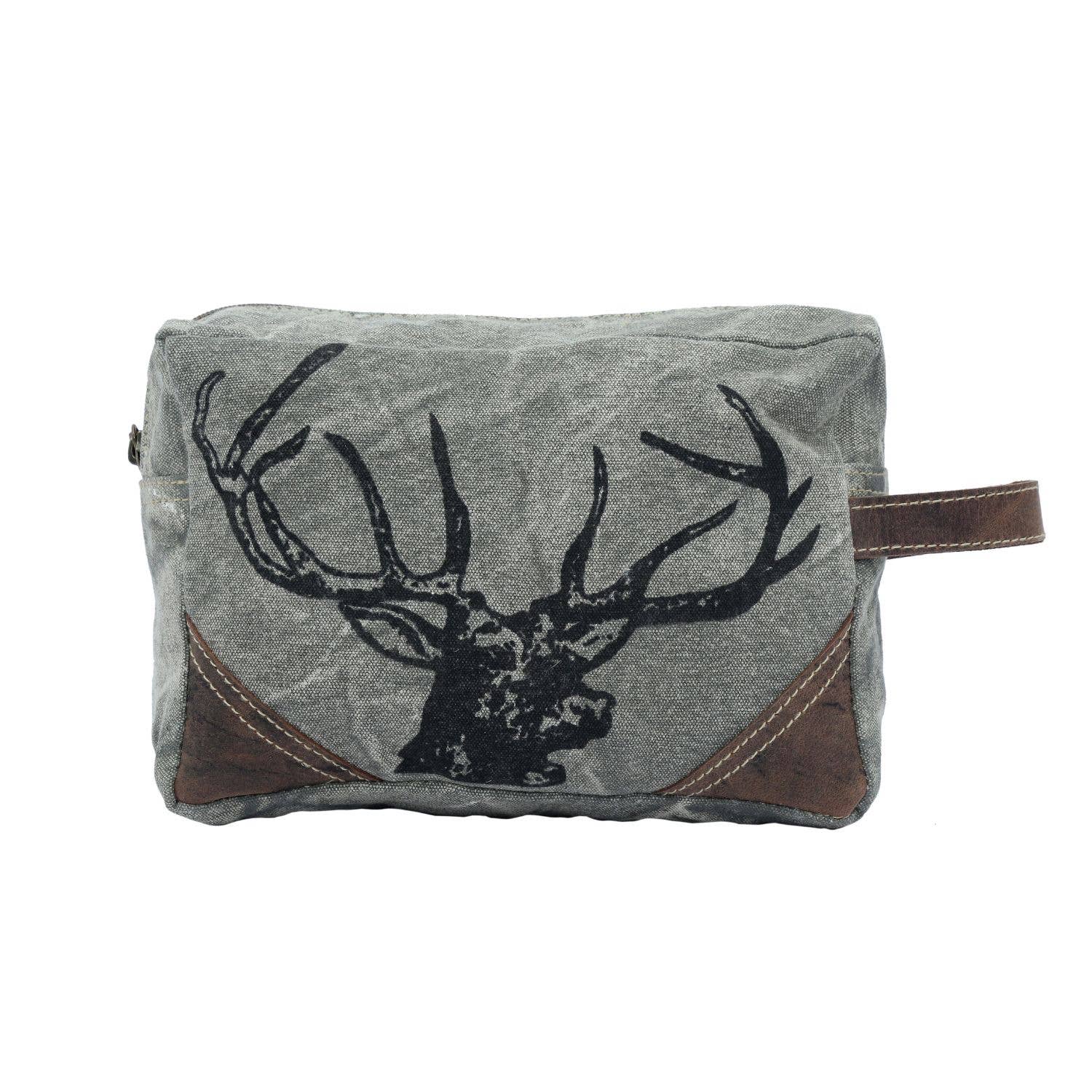 Revel Dopp Kit featuring upcycled canvas with a deer print and leather accents, ideal for carrying daily essentials.