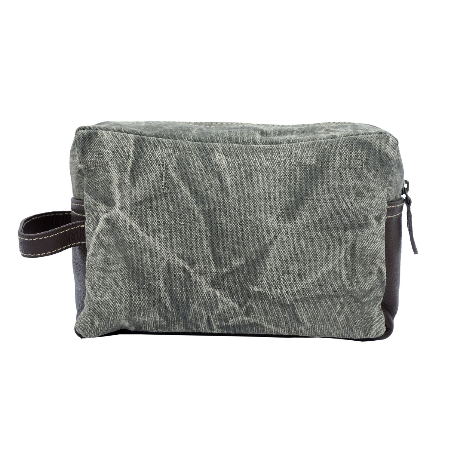 Revel Dopp Kit featuring upcycled canvas with a deer print and leather accents, ideal for carrying daily essentials.