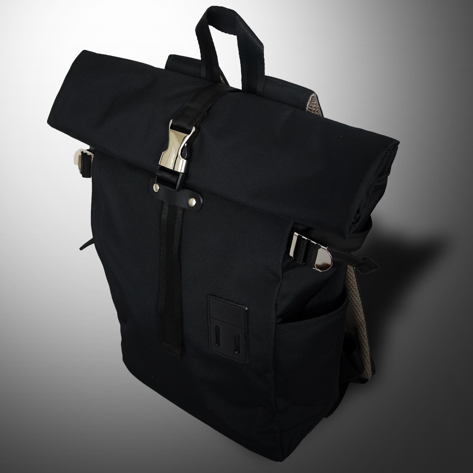 ROLLTOP BACKPACK 2.0 in various colors showcasing its modern design and multiple pockets.