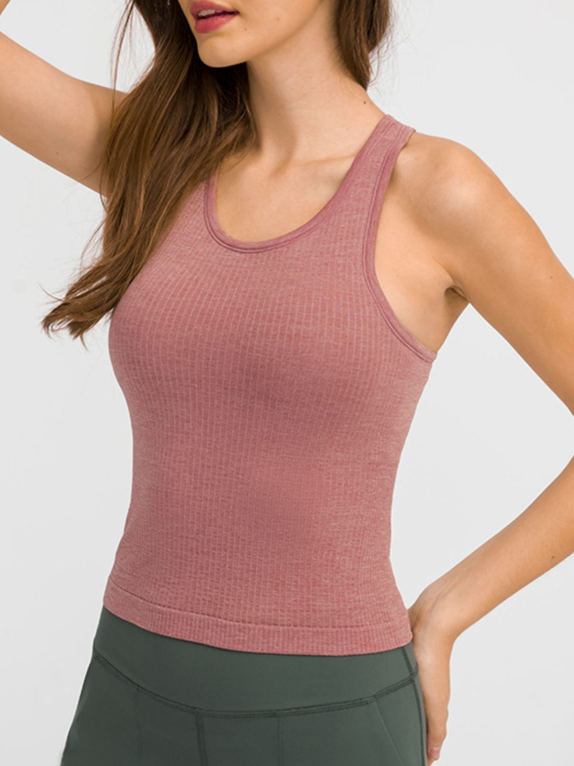 Round Neck Racerback Active Tank in various colors, showcasing removable padding and a comfortable fit.