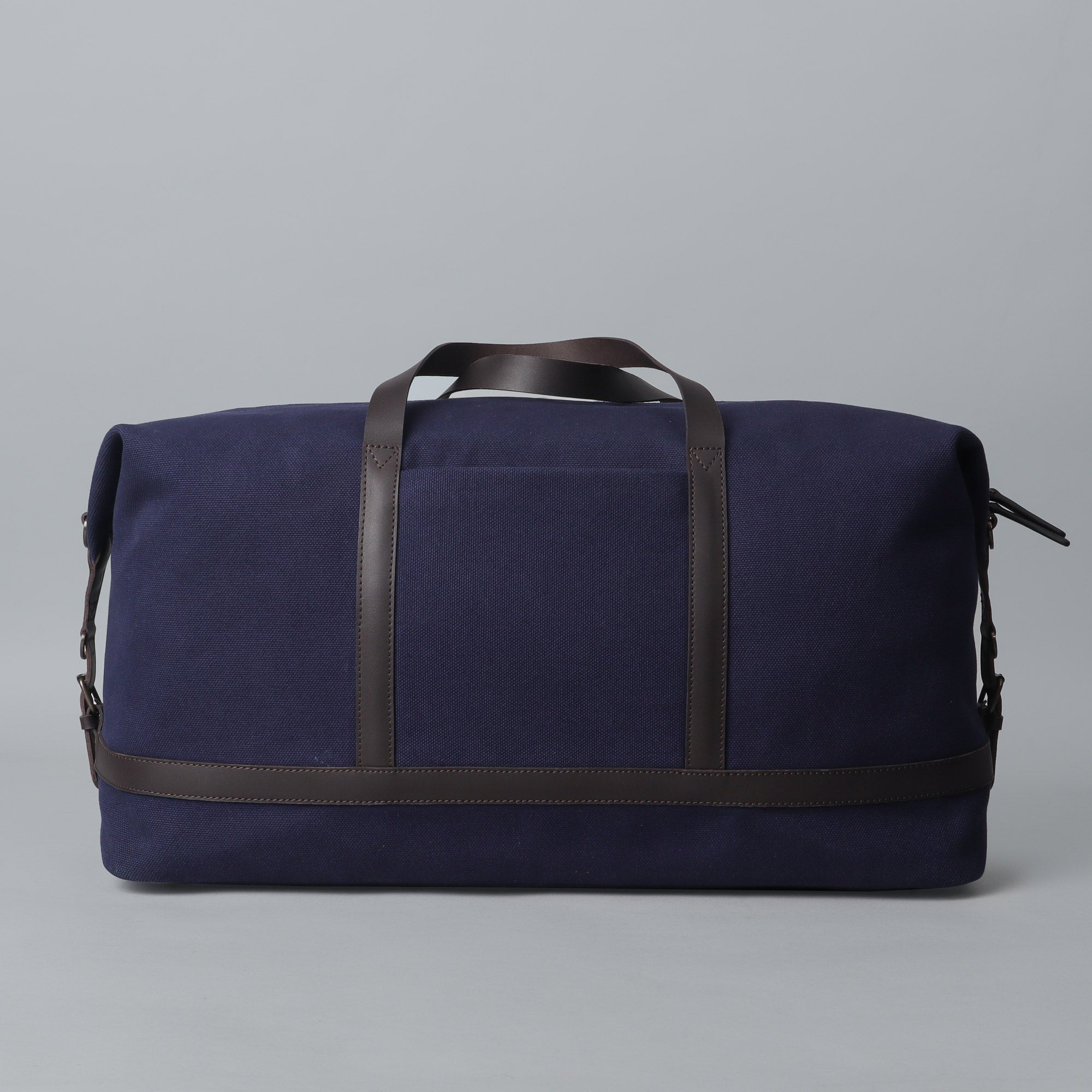 Runway Canvas Travel Bag showcasing its vintage design, adjustable strap, and durable materials, perfect for stylish travel.