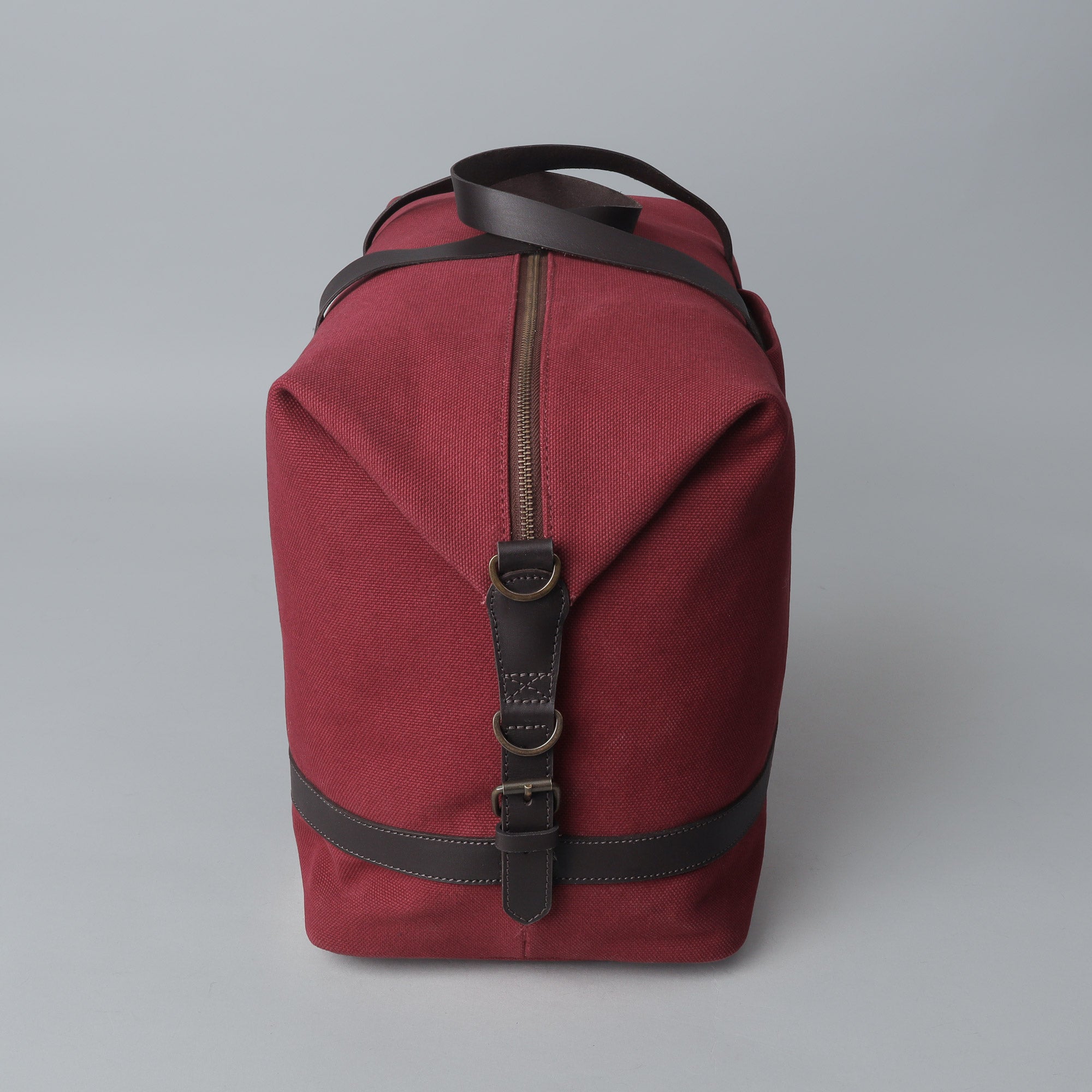 Runway Canvas Travel Bag showcasing its vintage design, adjustable shoulder strap, and durable materials.