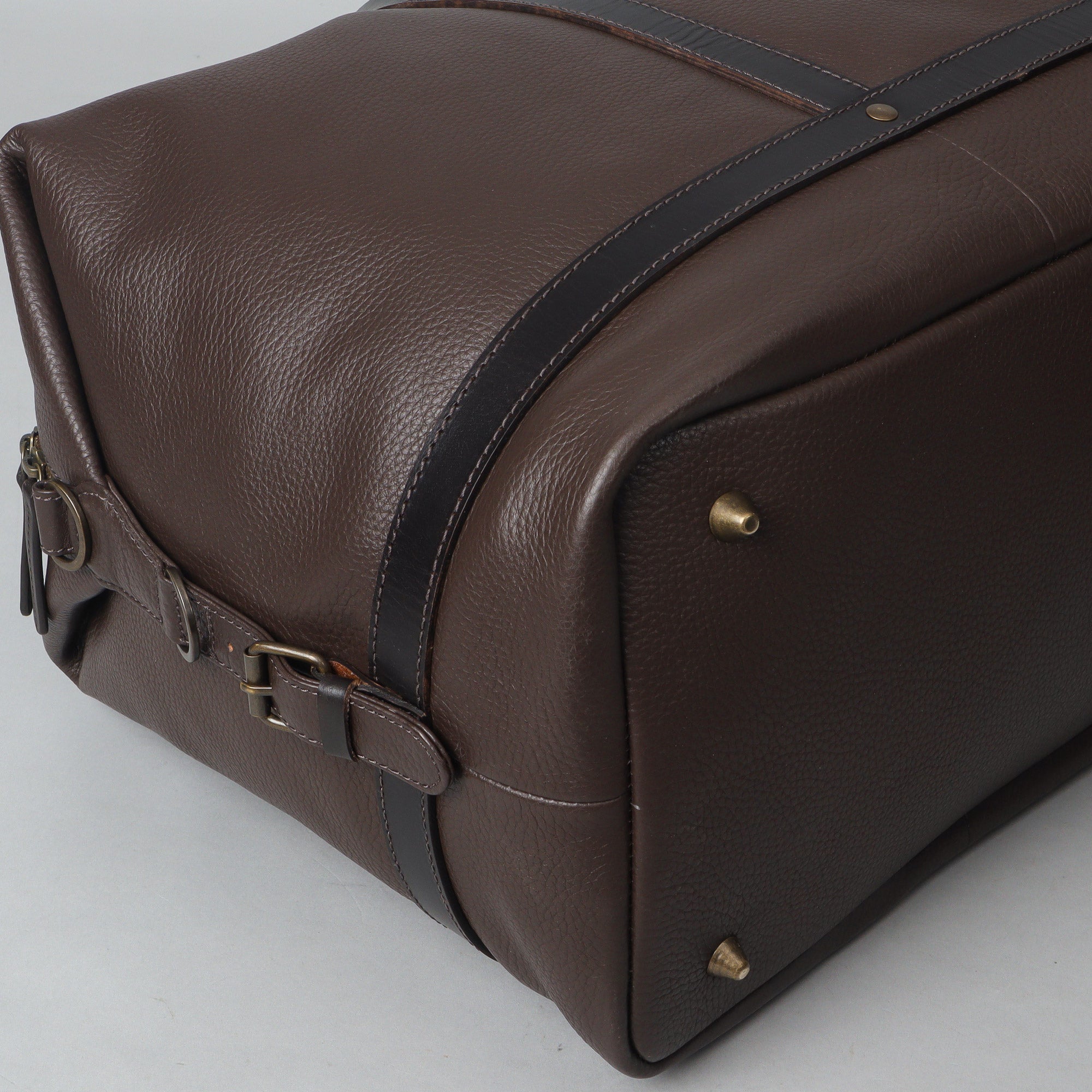 Runway Leather Travel Bag made from premium full grain leather, featuring adjustable shoulder strap, vintage buckles, and durable interior.