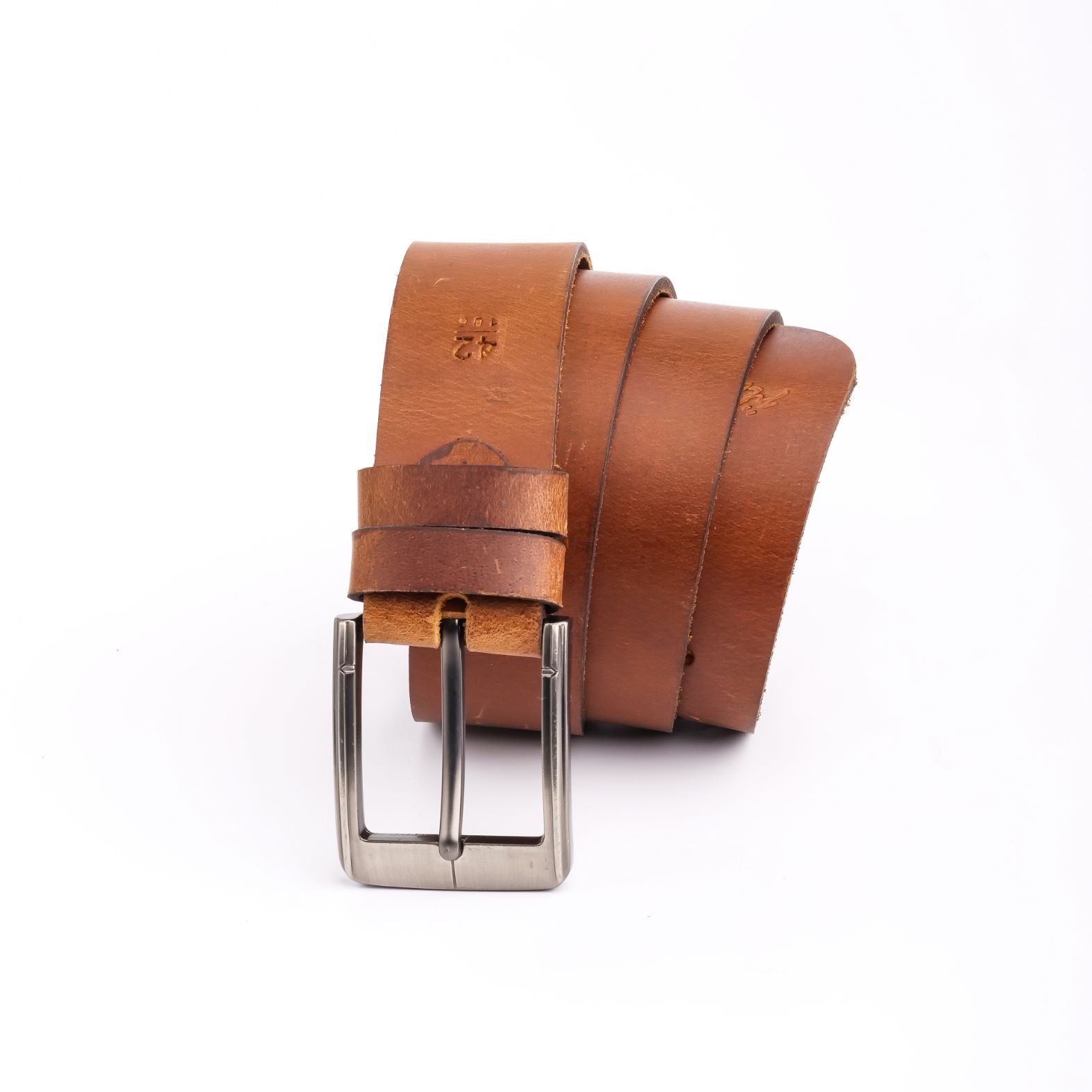 A rustic leather belt with double thread stitching and a single pin buckle, showcasing its quality and style.