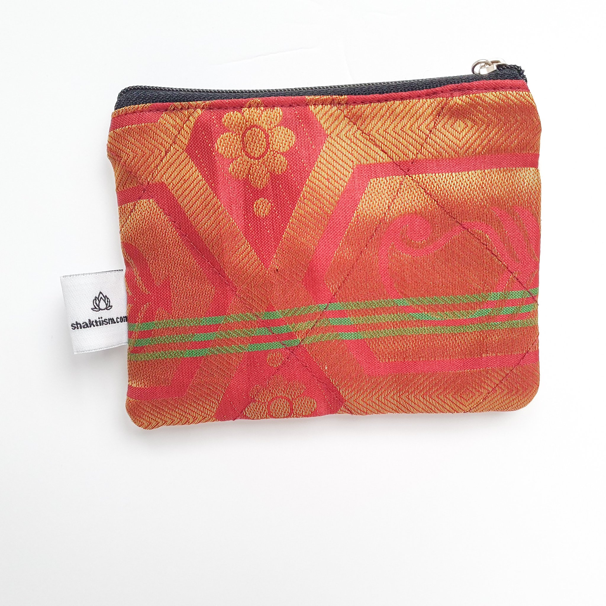 Colorful Sari coin purses made from reclaimed fabric, showcasing unique patterns and designs, ethically handmade by artisans in India.