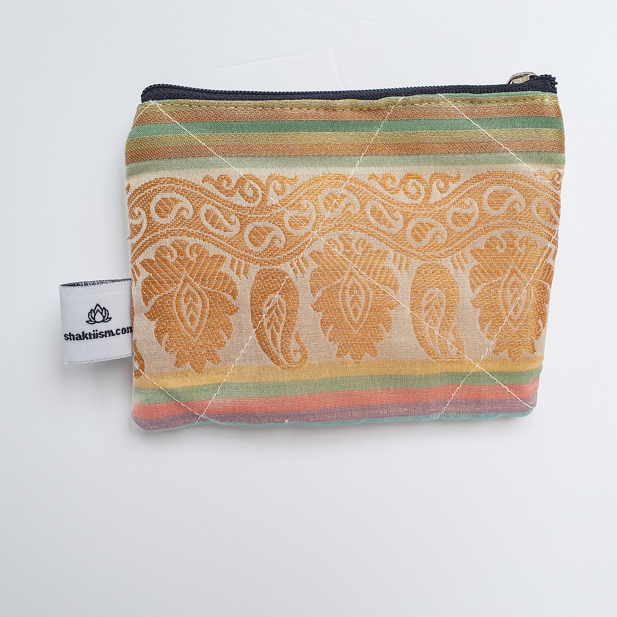 Colorful Sari coin purses made from reclaimed fabric, showcasing unique patterns and designs, ethically handmade by artisans in India.