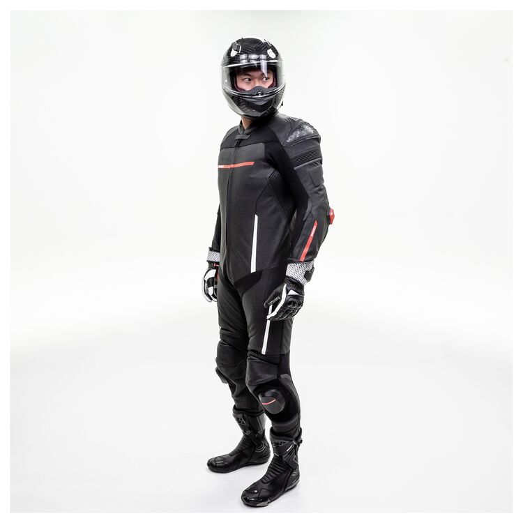 Sedici Corsa One-Piece Race Suit showcasing premium cowhide construction and aggressive race fit, designed for maximum mobility and protection.