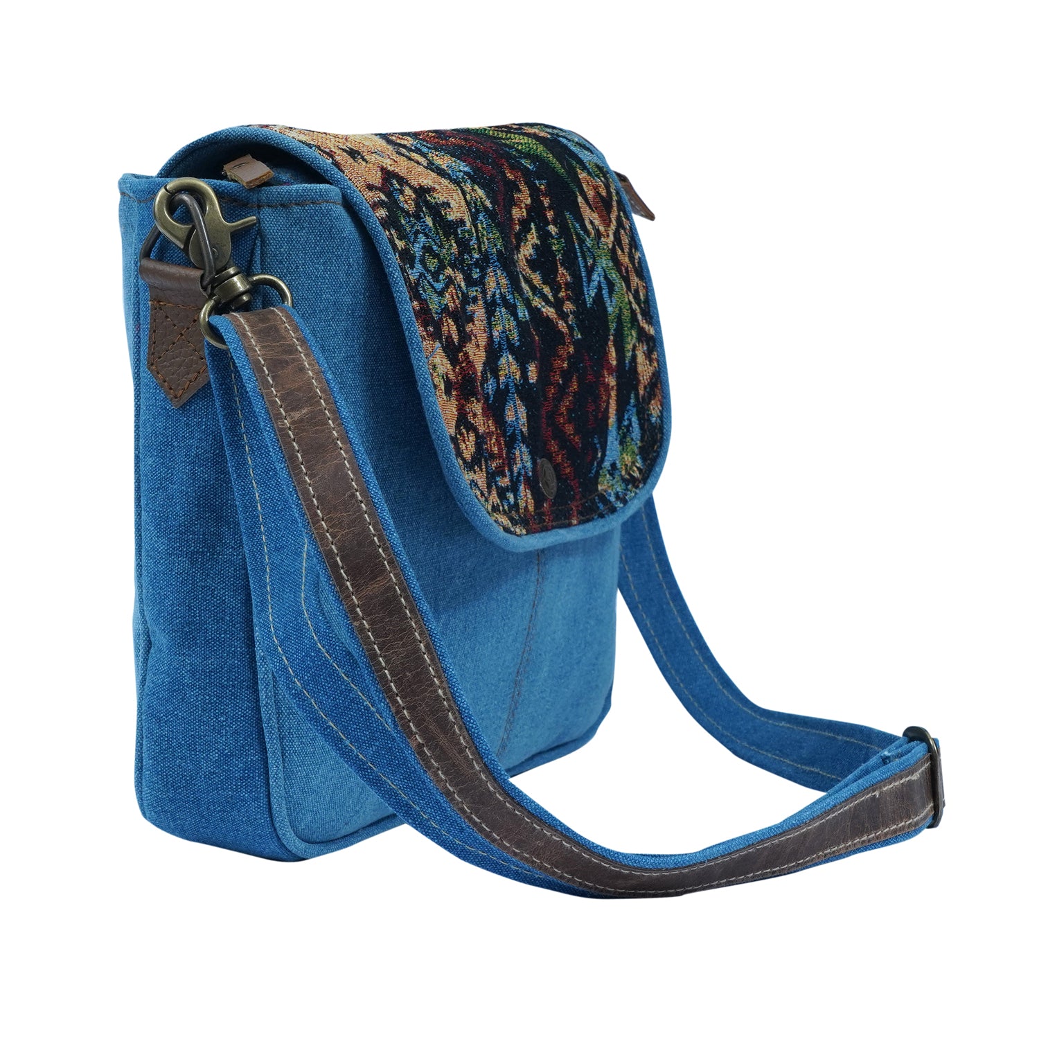 Sedo Crossbody Bag made of denim and cotton, featuring an adjustable strap and spacious interior.