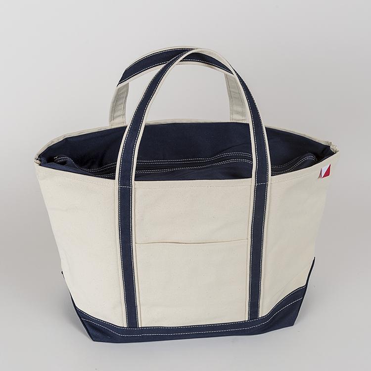 ShoreBags Classic Tote Large featuring reinforced handles and zippered top, ideal for beach and grocery use.