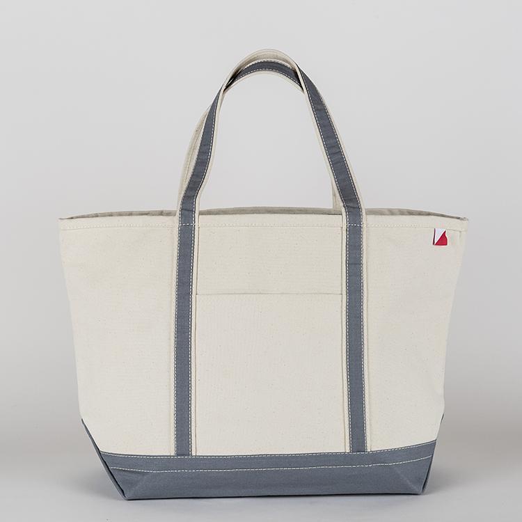 ShoreBags Classic Tote Large featuring reinforced handles and zippered top, ideal for beach and grocery use.