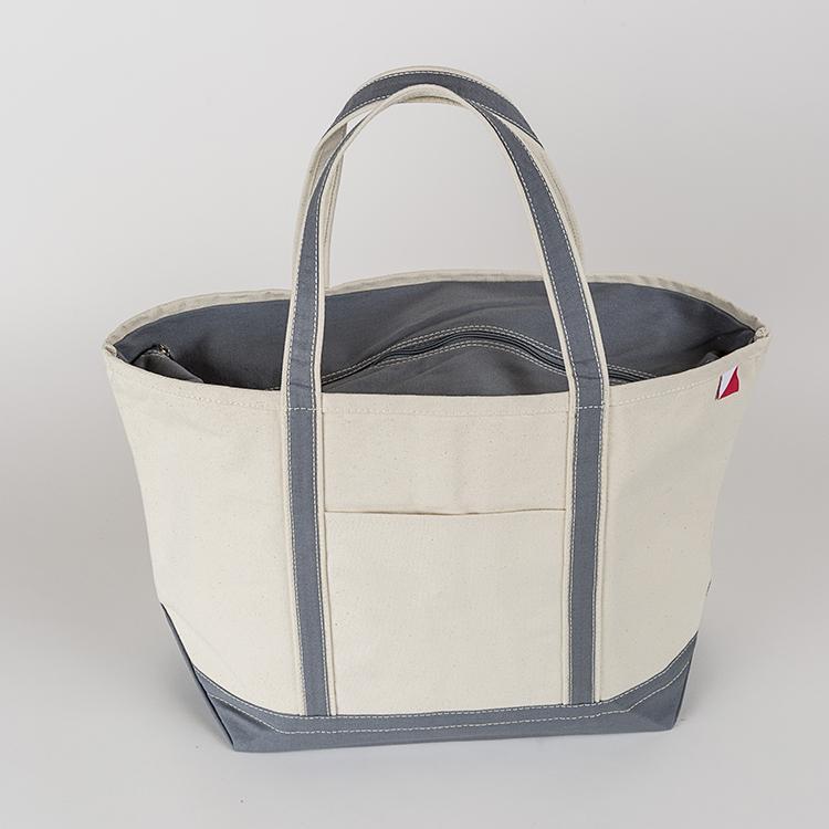 ShoreBags Classic Tote Large featuring reinforced handles and zippered top, ideal for beach and grocery use.