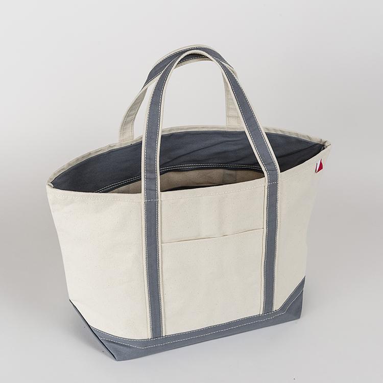 ShoreBags Classic Tote Large featuring reinforced handles and zippered top, ideal for beach and grocery use.