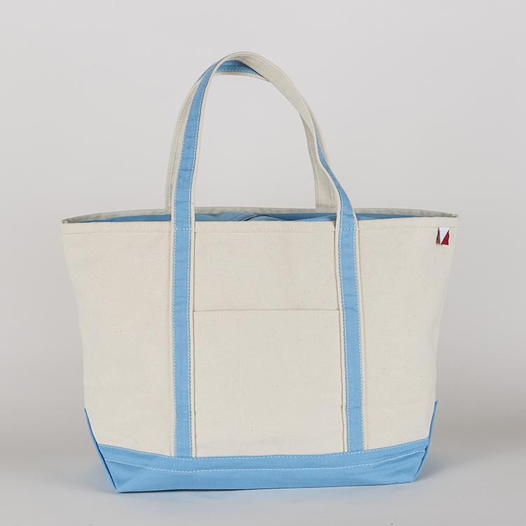 ShoreBags Classic Tote Large featuring reinforced handles and zippered top, ideal for beach and grocery use.