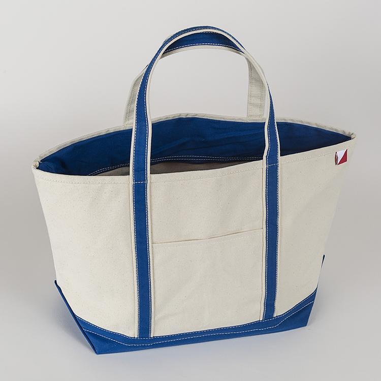 ShoreBags Classic Tote Large featuring reinforced handles and zippered top, ideal for beach and grocery use.