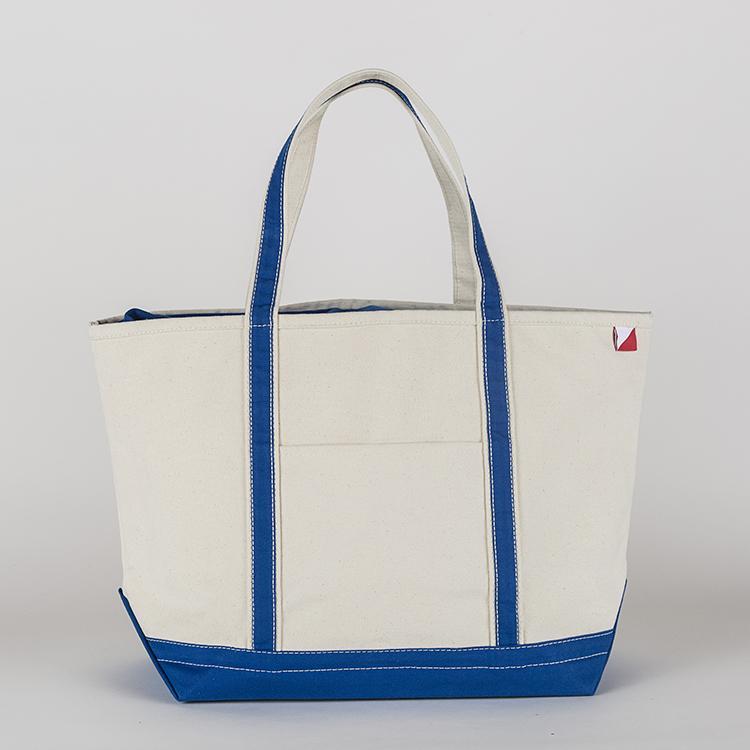 ShoreBags Classic Tote Large featuring reinforced handles and zippered top, ideal for beach and grocery use.